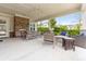 Inviting outdoor seating area with a fireplace for cozy gatherings at 525 Purple Finch Rd, Summerville, SC 29486