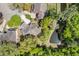 Aerial view of a home with a pond and surrounded by lush trees at 5471 Rising Tide, North Charleston, SC 29420