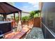 A backyard patio features a gazebo-covered hot tub at 5471 Rising Tide, North Charleston, SC 29420