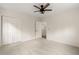 Bright bedroom features a modern ceiling fan, carpet floors, and a closet for optimal storage at 5950 Kelseys Mill Rd, Ravenel, SC 29470