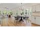 Open-concept kitchen and living room with lots of natural light at 5950 Kelseys Mill Rd, Ravenel, SC 29470