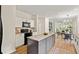 Well-equipped kitchen featuring an island, modern appliances, and a breakfast bar at 5950 Kelseys Mill Rd, Ravenel, SC 29470