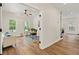 Bright home office featuring natural light, hardwood floors, and a stylish workspace in a modern design at 5950 Kelseys Mill Rd, Ravenel, SC 29470