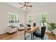 Inviting home office with bright windows, stylish furnishings, and modern decor for an inspiring workspace at 5950 Kelseys Mill Rd, Ravenel, SC 29470
