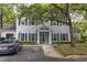 Two-story home with beautiful landscaping and ample parking, showcasing the building's curb appeal at 60 Fenwick Hall Aly # 937, Johns Island, SC 29455