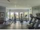 Well-lit fitness center with modern cardio equipment, weights, and ample room for exercise at 60 Fenwick Hall Aly # 937, Johns Island, SC 29455