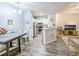 Inviting dining area blending seamlessly with a modern kitchen and comfortable living space at 60 Fenwick Hall Aly # 937, Johns Island, SC 29455