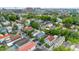Wide aerial shot of a city neighborhood with houses, streets, and mature landscaping at 9 Kracke St # A & B, Charleston, SC 29403
