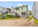 View of the backyard and exterior stairs at 9 Kracke St # A & B, Charleston, SC 29403