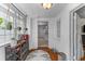 Bright hallway with hardwood floors, stylish accents, and plenty of natural light at 9 Kracke St # A & B, Charleston, SC 29403