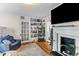 Inviting living room featuring hardwood floors, fireplace, and classic decor at 9 Kracke St # A & B, Charleston, SC 29403