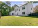 Large backyard with a patio and lush green grass at 9609 Portal Ct, Summerville, SC 29485