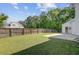 Fenced in backyard with patio and grassy area at 9609 Portal Ct, Summerville, SC 29485