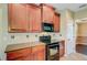 Well-equipped kitchen featuring modern appliances, tile backsplash, and plenty of counter space at 9609 Portal Ct, Summerville, SC 29485