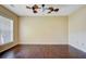 Bright living room featuring hardwood floors and a ceiling fan at 9609 Portal Ct, Summerville, SC 29485