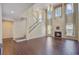 Bright and airy living space showcasing hardwood floors, high ceilings, and a fireplace at 9609 Portal Ct, Summerville, SC 29485