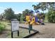 Community playground with swings, slides, and climbing area for  at 9609 Portal Ct, Summerville, SC 29485
