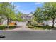 Charming home with a two-car garage, well-manicured lawn, mature trees, and attractive curb appeal at 9670 Pebble Creek Blvd, Summerville, SC 29485