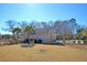 The community pool house has restrooms, changing rooms, showers, and an adjacent playground and pool at 9670 Pebble Creek Blvd, Summerville, SC 29485