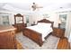 Luxurious bedroom with a decorative tray ceiling, hardwood floors, and elegant furnishings at 100 N Gateshead Xing, Goose Creek, SC 29445