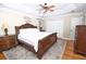 Primary bedroom features hardwood floors, a ceiling fan, and natural light at 100 N Gateshead Xing, Goose Creek, SC 29445