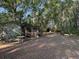 Storage shed in wooded backyard perfect for hobbies or extra space at 1020 Welles Ln, Walterboro, SC 29488