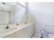 Bright bathroom with dual sinks, a large mirror, white cabinetry, and a shower-tub combo with white tiling at 103 Grand Pavilion Blvd, Isle of Palms, SC 29451