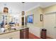 Bright kitchen offers granite countertops, stainless steel appliances, and an open layout to the living area at 103 Grand Pavilion Blvd, Isle of Palms, SC 29451