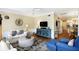 Comfortable living room features stylish furnishings, a ceiling fan, and neutral decor for a relaxing atmosphere at 103 Grand Pavilion Blvd, Isle of Palms, SC 29451
