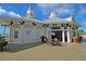 Charming pool house with ample seating, dining areas, and shaded spots for relaxation with ocean views at 103 Grand Pavilion Blvd, Isle of Palms, SC 29451
