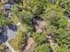 Aerial view of a home showcasing lush, mature landscaping and a serene residential setting at 106 Spring Farm Pl, Summerville, SC 29485