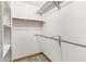 Walk-in closet featuring built-in shelving and metal rods, offering ample storage solutions at 106 Spring Farm Pl, Summerville, SC 29485