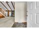 Inviting foyer with a glimpse into a spacious living area featuring a stone fireplace and wood accents at 106 Spring Farm Pl, Summerville, SC 29485