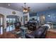 Spacious living room with hardwood floors and seamless transition to other living areas at 107 Towering Pine Dr, Ladson, SC 29456