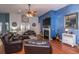 Comfortable living room featuring a fireplace, ceiling fan, and hardwood floors at 107 Towering Pine Dr, Ladson, SC 29456