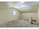 Attic space with carpet, window and view of the stairs with washer and dryer at 109 Winston Way, Goose Creek, SC 29445