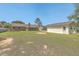 Expansive backyard featuring lush lawn and various structures at 109 Winston Way, Goose Creek, SC 29445
