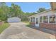 Spacious backyard with large two-car detached garage at 109 Winston Way, Goose Creek, SC 29445