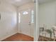 Bright entryway with beautiful wood floors and a charming side table, creating a welcoming space at 109 Winston Way, Goose Creek, SC 29445