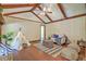 Spacious living room offers hardwood floors, exposed beams, and a comfortable seating area at 109 Winston Way, Goose Creek, SC 29445