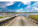 Beautiful daytime view of a boat ramp leading to the marsh and river at 111 Tidewater Way, Charleston, SC 29492