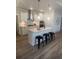 Bright kitchen boasts a large island with seating and stainless steel appliances at 113 Seaton St, Summerville, SC 29486