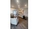 Open-concept living room flowing into the kitchen, perfect for modern living and entertaining at 113 Seaton St, Summerville, SC 29486
