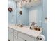 Nautical themed bathroom with white countertop, marine accessories, and a decorative mirror feature at 1167 Mossy Rock Dr, Summerville, SC 29485