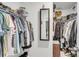 Walk-in closet with adjustable wire shelving, plenty of hanging storage and room for shoes and accessories at 1167 Mossy Rock Dr, Summerville, SC 29485