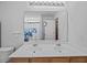 Bathroom featuring double sink vanity, large mirror and shower with blue floral curtain at 1218 Cosmos Rd, Summerville, SC 29483