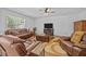 Spacious living room with plush leather furniture and a ceiling fan at 1218 Cosmos Rd, Summerville, SC 29483