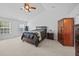 Spacious bedroom features vaulted ceiling, neutral carpet, and ample natural light from the large windows at 1218 Cosmos Rd, Summerville, SC 29483