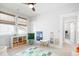 Bright bedroom with a ceiling fan, natural light, and a cozy play area for  at 127 Archdale St, Summerville, SC 29486