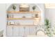 Built-in shelves with storage and decor in an alcove at 127 Archdale St, Summerville, SC 29486